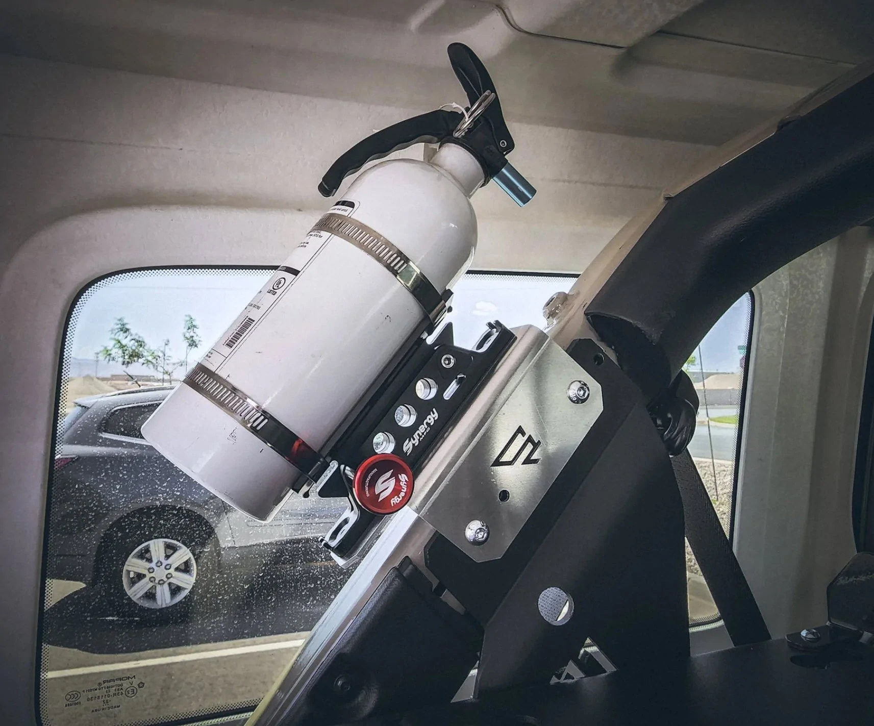 Jeep JLU C-Pillar Fire Extinguisher Mount.webp
