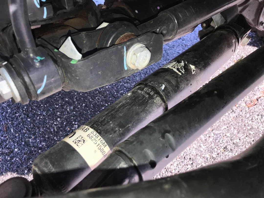 Jeep Wrangler JL Steering Stabilizer Cover...How to put back on? 3