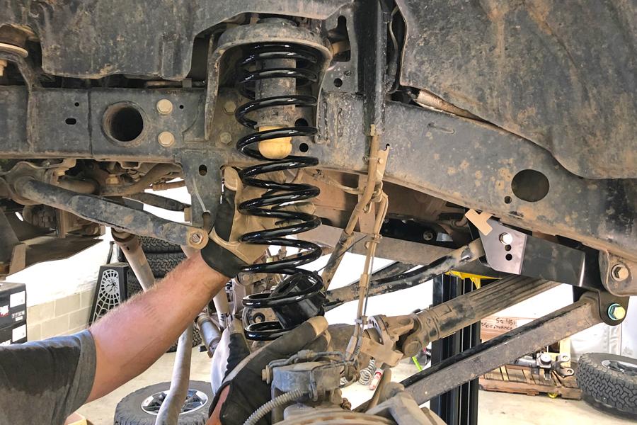 Jeep Wrangler JL 2" Rancho Lift Kit How-To installing-rancho-front-jl-coil-sprin