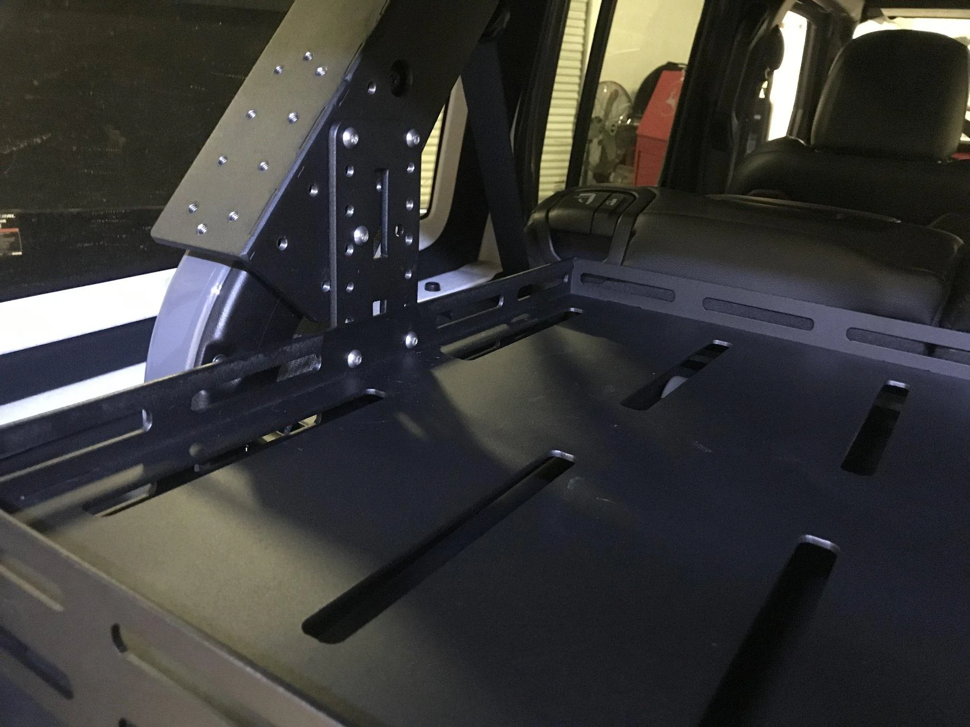 Jeep Wrangler JL Storage shelf attached to roll bar 7E73C525-4B2B-450F-8F2D-D5966A09E8C0