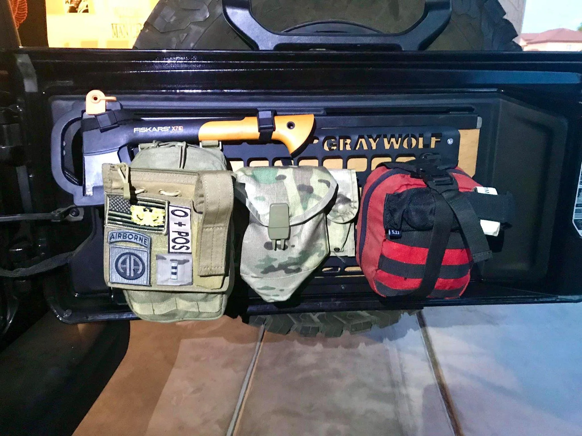 Jeep Wrangler JL Finally - got a Molle tailgate table with slide-out Molle tailgate with gear