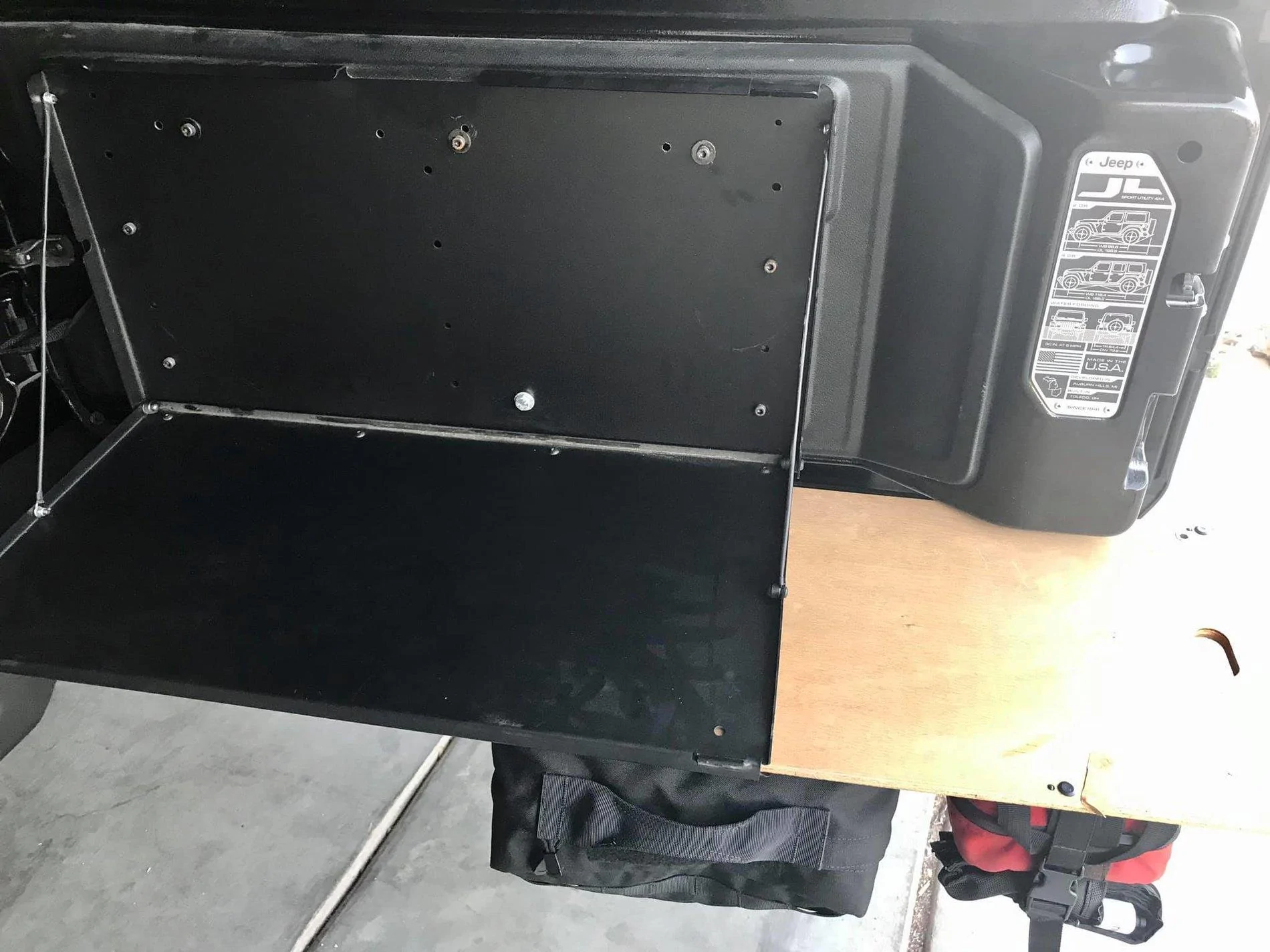 Jeep Wrangler JL Finally - got a Molle tailgate table with slide-out Tailgate table open