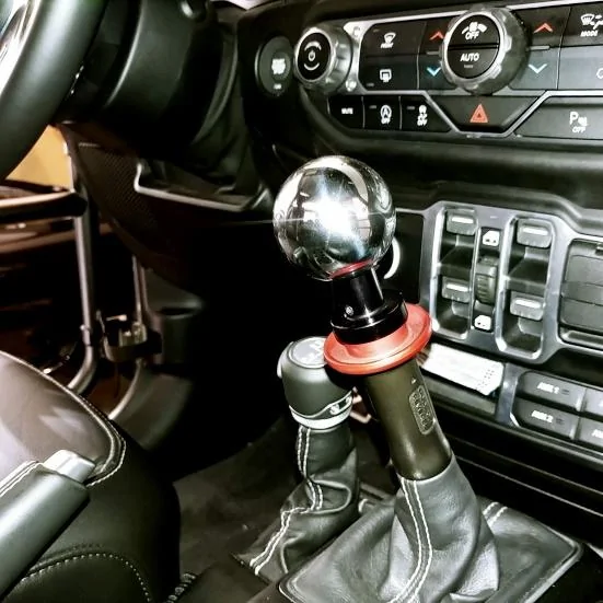 Jeep Wrangler JL Aftermarket shift knobs for the 6 speed. Post pics 05