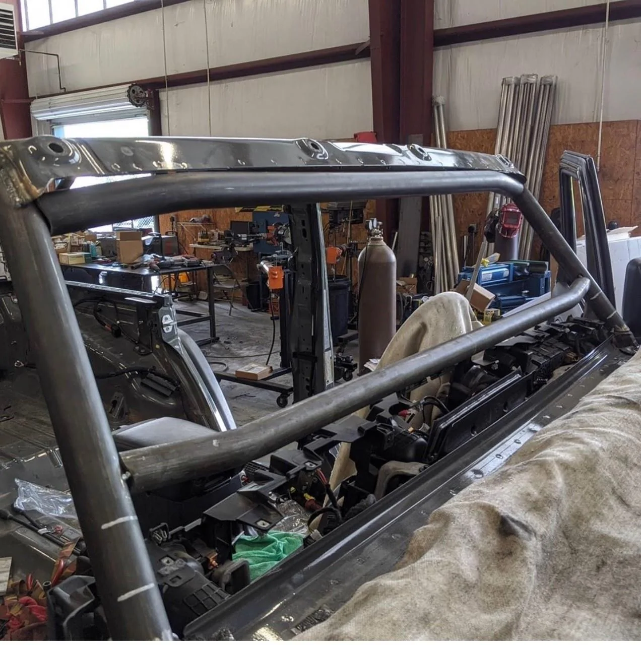 Jeep Wrangler JL Full custom cage going in jeep 3