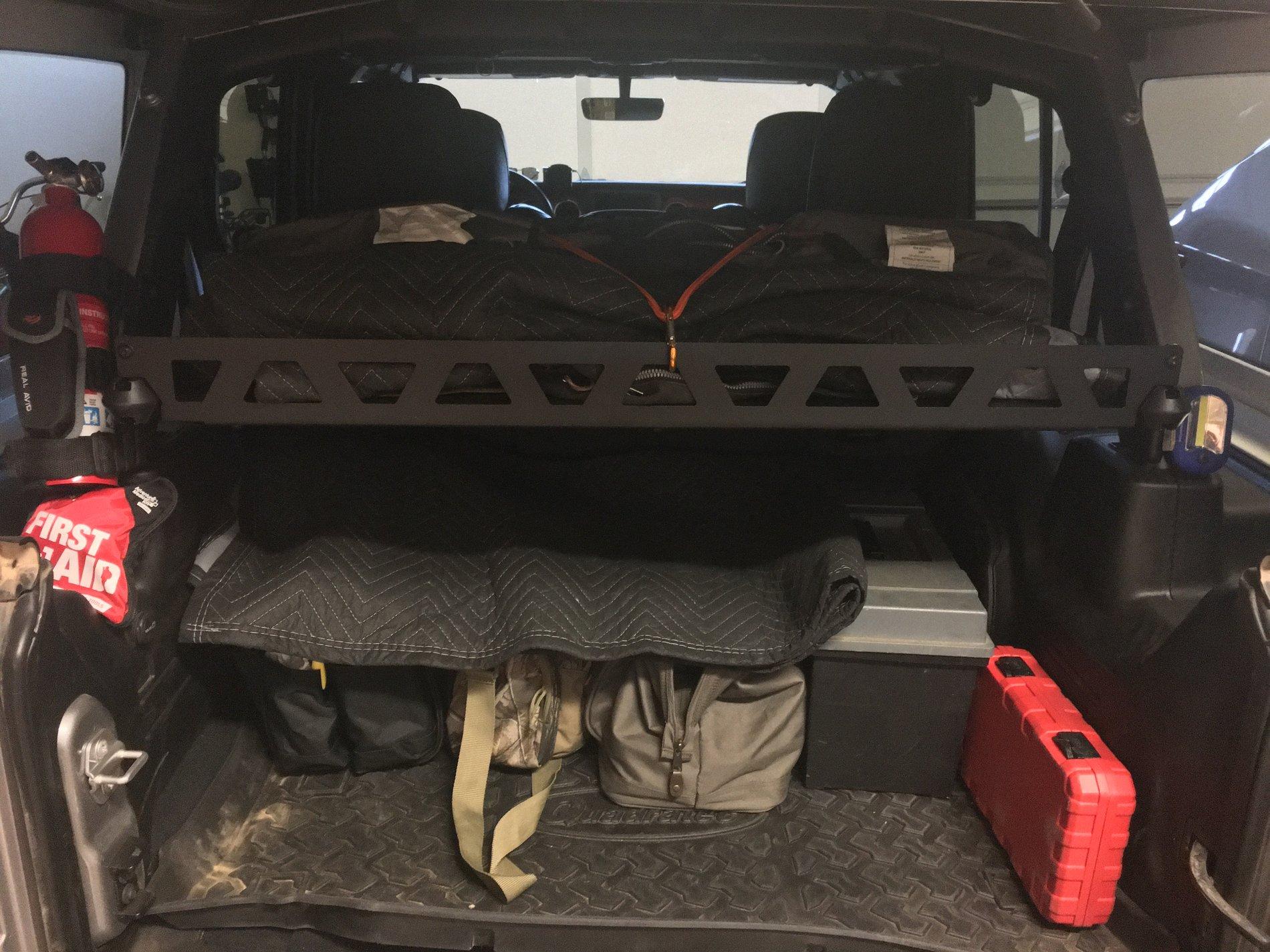 Jeep Wrangler JL Rollbar mounted cargo shelf DeeZee Shelf.JPG