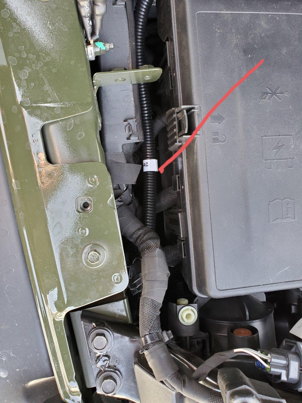 Jeep Wrangler JL Where is the engine block heater cord? B03418B3-20E1-4774-BCEF-A9CF38E54E4F