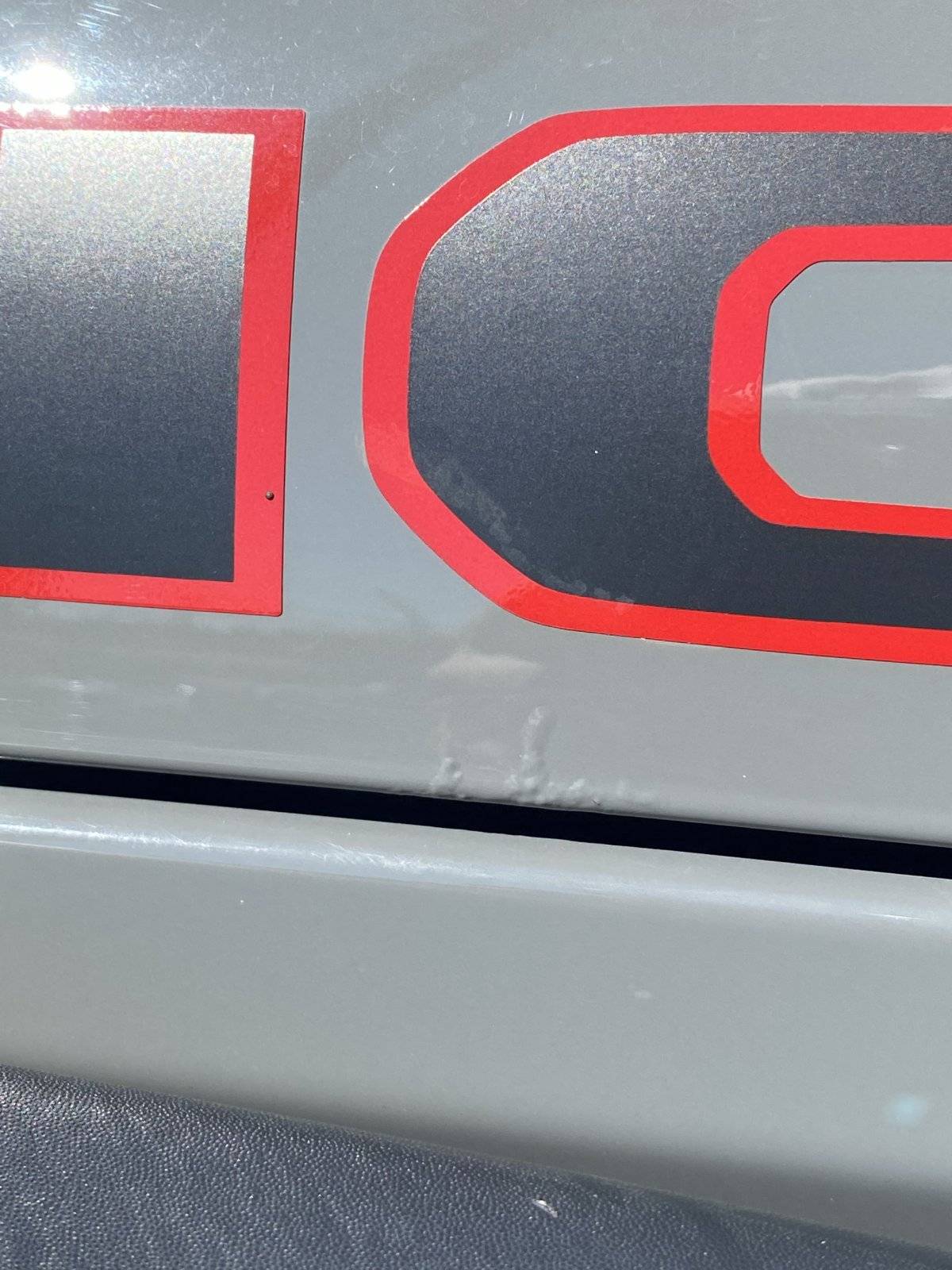 Jeep Wrangler JL Bubbles in Paint at Door Hinges paint2