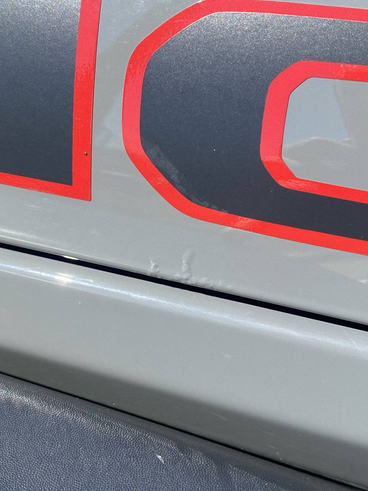 Jeep Wrangler JL Bubbles in Paint at Door Hinges paint3
