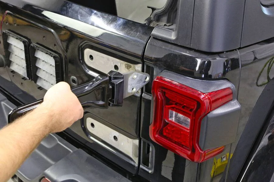 Jeep Wrangler JL Bubbles in Paint at Door Hinges remove-jl-tailgate-hing