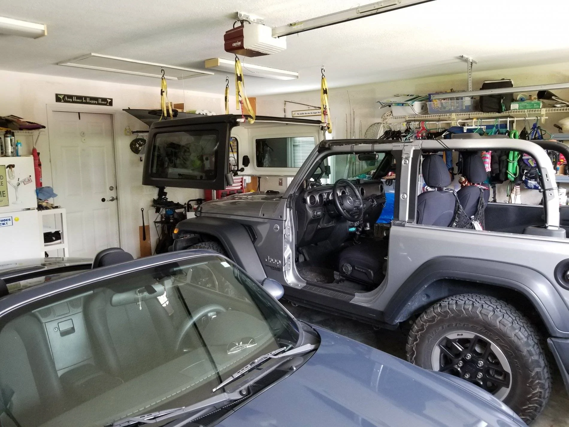 Jeep Wrangler JL Hanging top from garage ceiling. 20200329_112313
