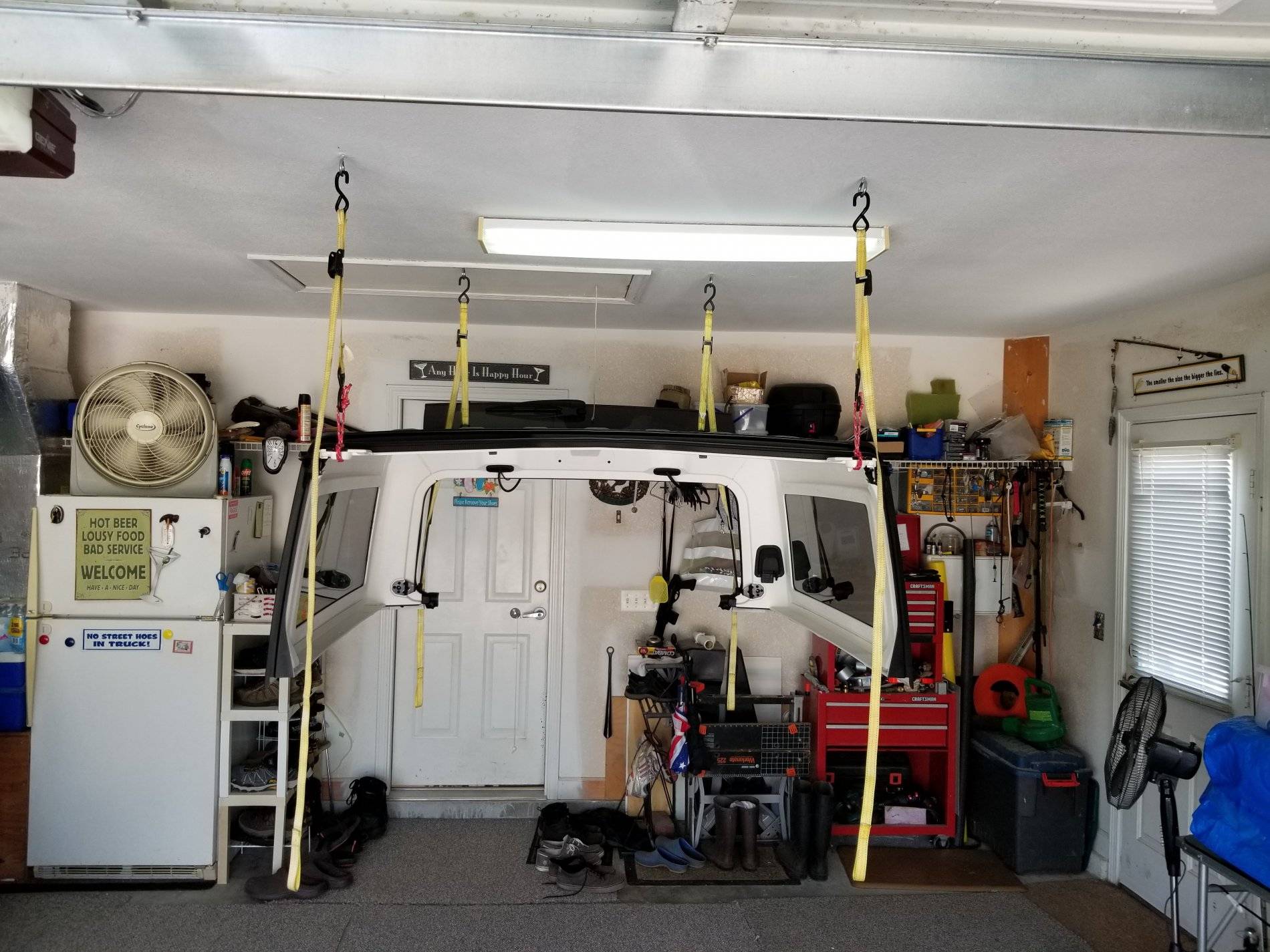 Jeep Wrangler JL Hanging top from garage ceiling. 20190525_130331