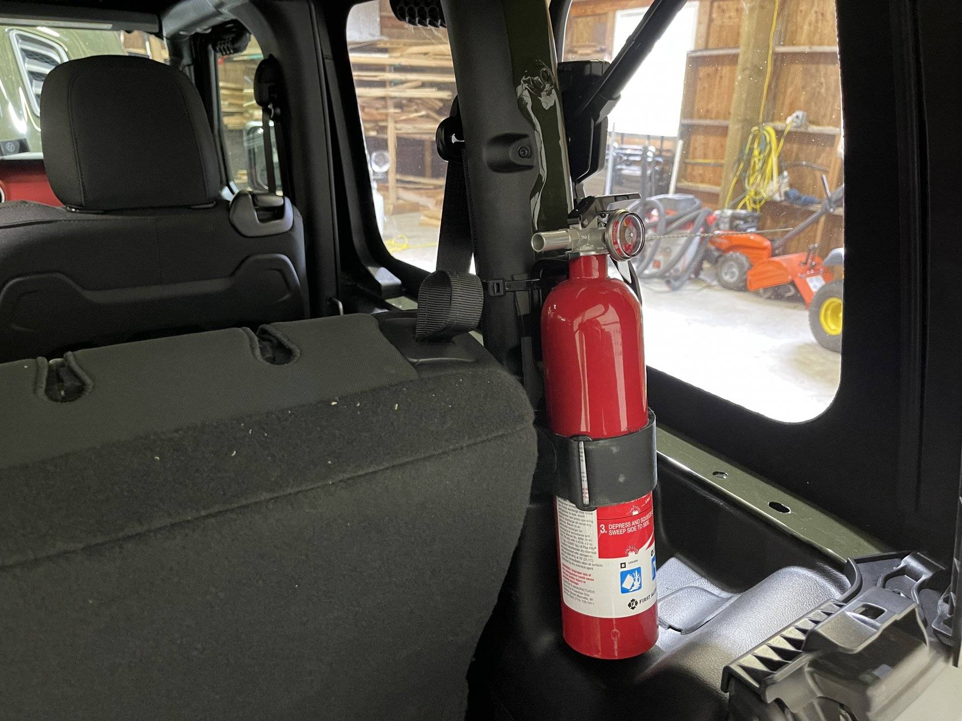 Jeep Wrangler JL Fire Extinguisher Mounting Options for Soft Top 5178066C-EBC8-4726-82BB-D5F9695FDC3B