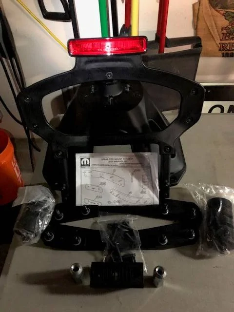 Jeep Wrangler JL $100 - JL Spare Tire Mounts - Mopar Relocation Bracket Jeep Tire Mounting Parts