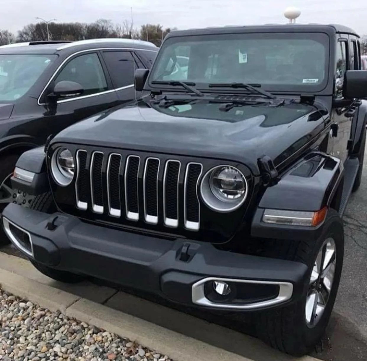 black-2018-Jeep-Wrangler-Unlimited-Sahara-A.webp