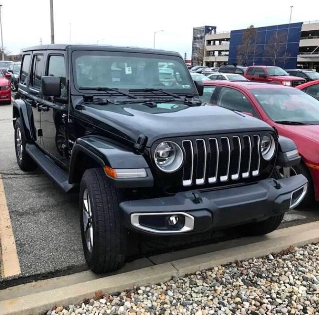black-2018-Jeep-Wrangler-Unlimited-Sahara-B.webp