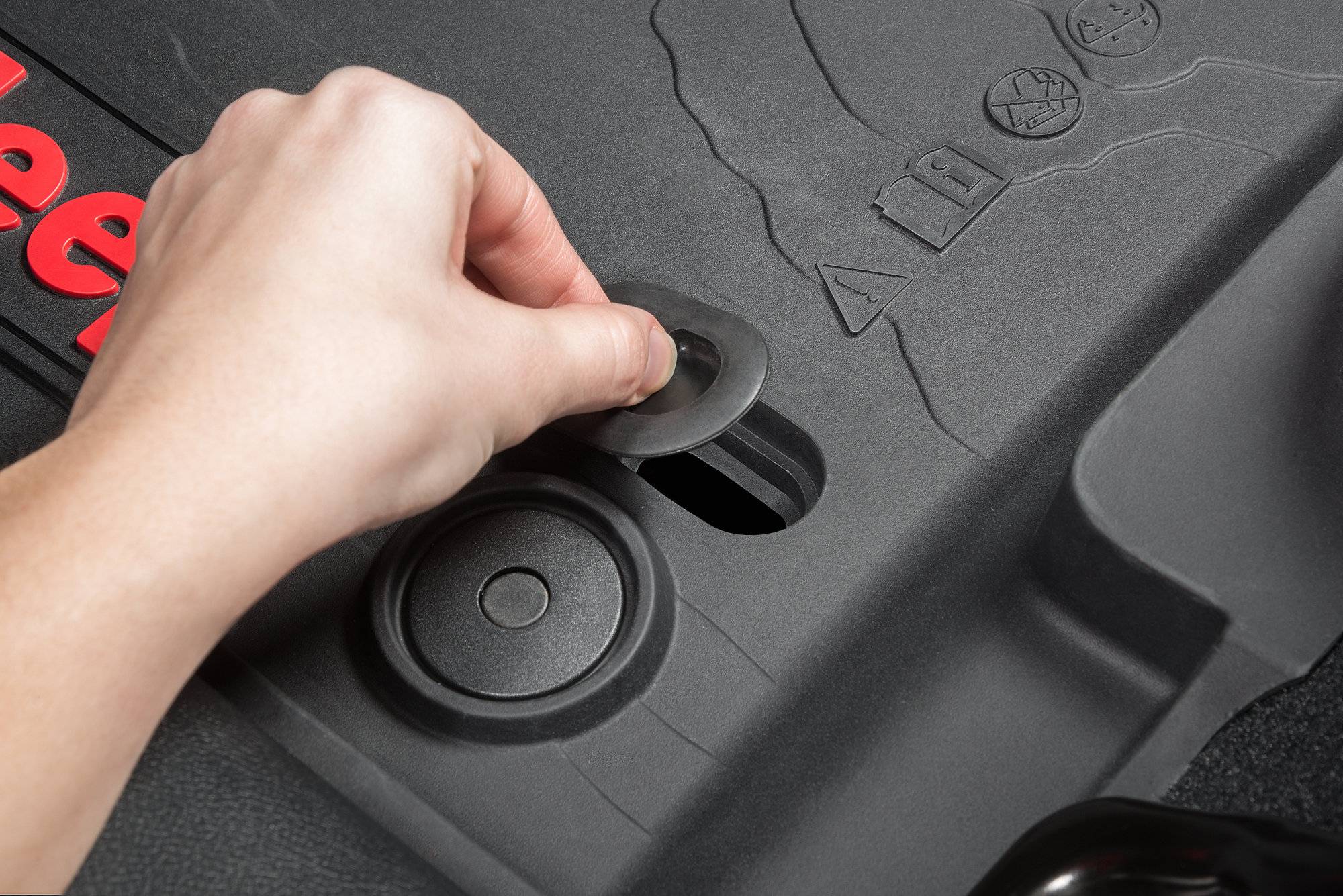 Mopar_82215203AC_All-Weather_Front_Rear_Floor_Liner_Plug_Installing.jpg