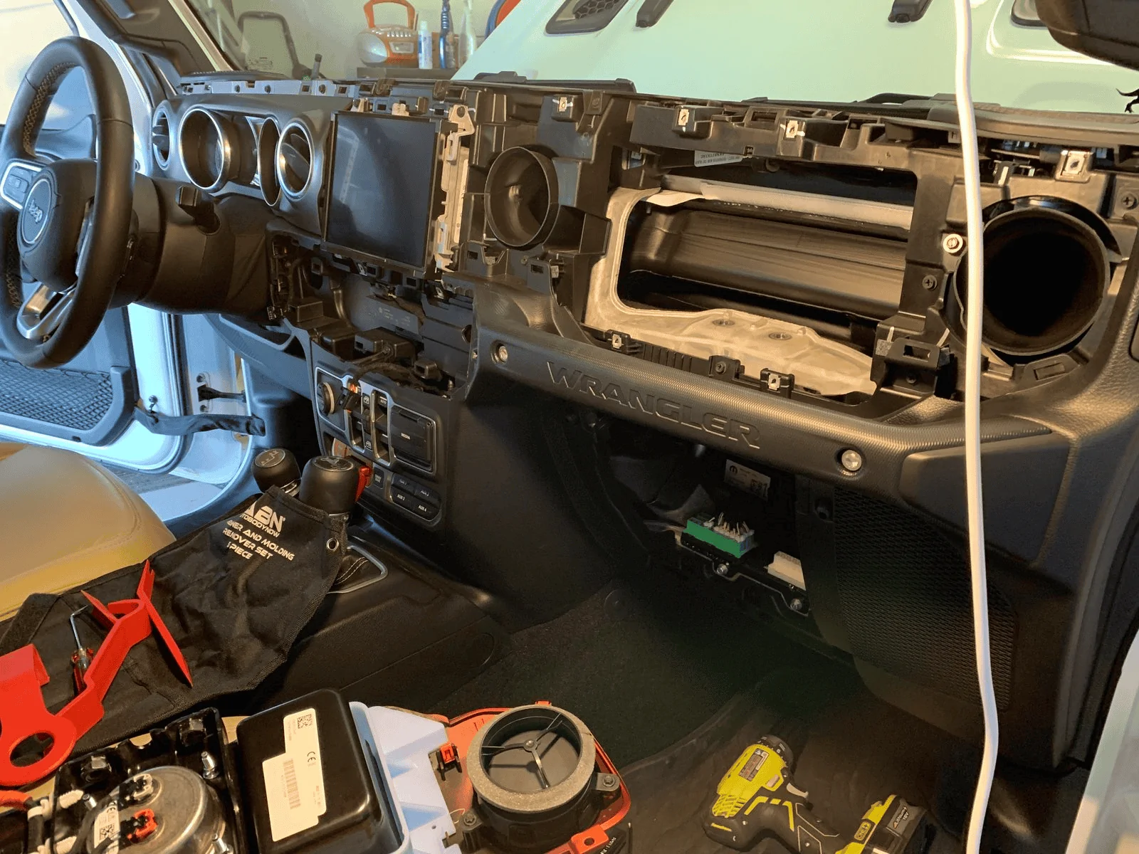 Jeep Wrangler JL Will these storage trays affect the airbag? 1643814764576