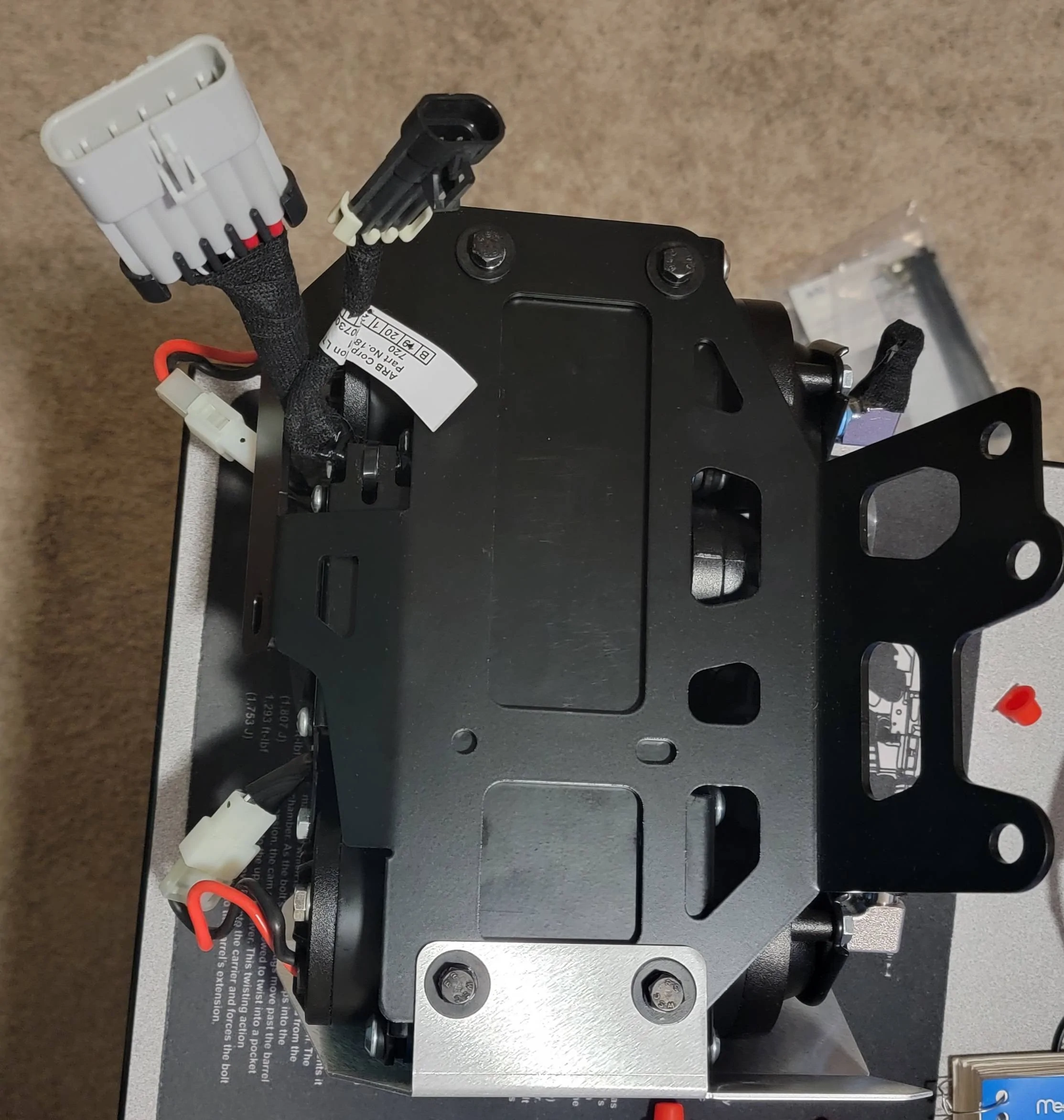 Jeep Wrangler JL Grimm Offroad Mount + ARB Compressor Install 01 - Bottom of ARB in Grimm Mount