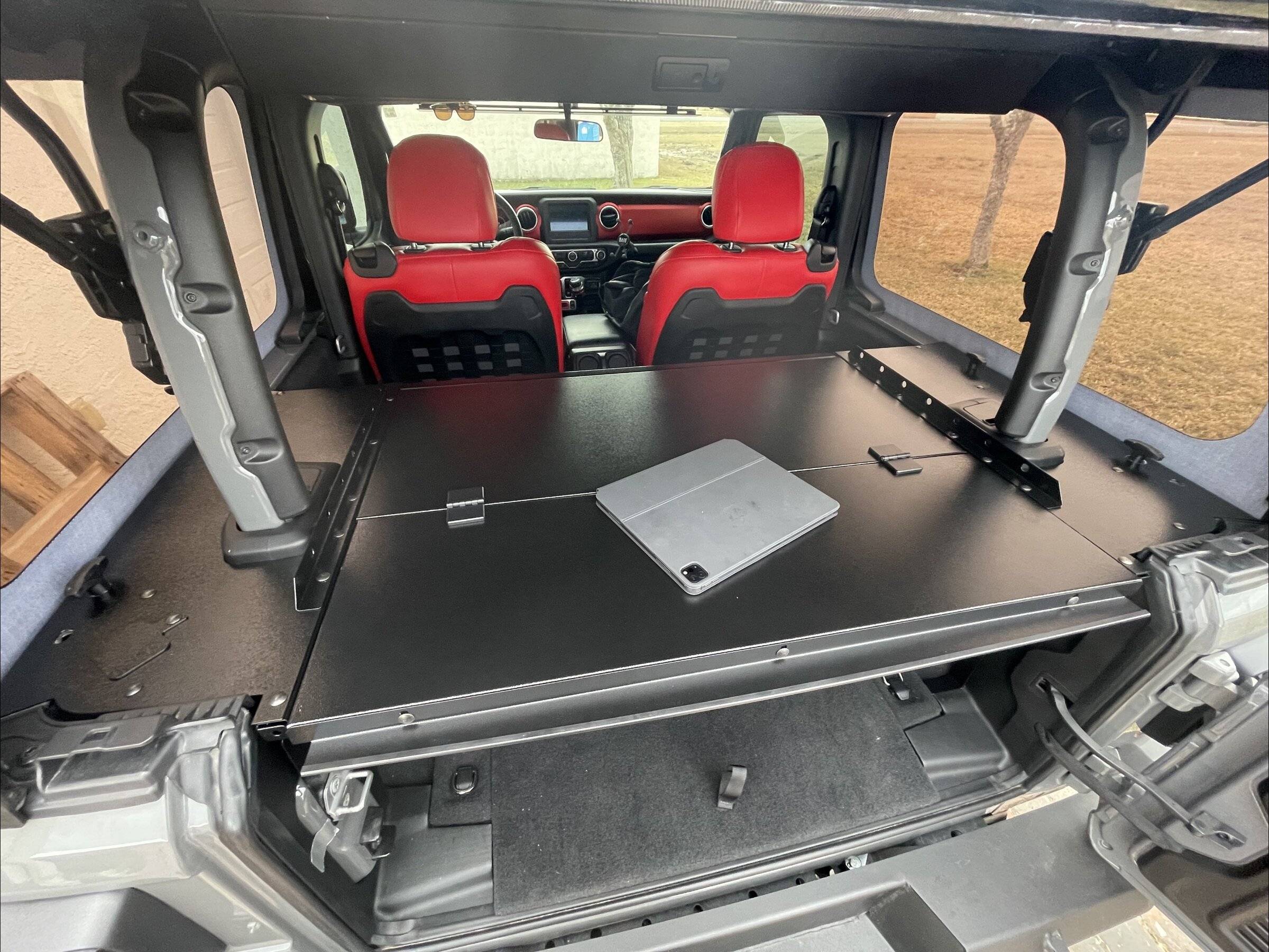 Jeep Wrangler JL rear footwell storage solutions? 906195E9-BAEA-4FC7-B476-B3D7283695C1