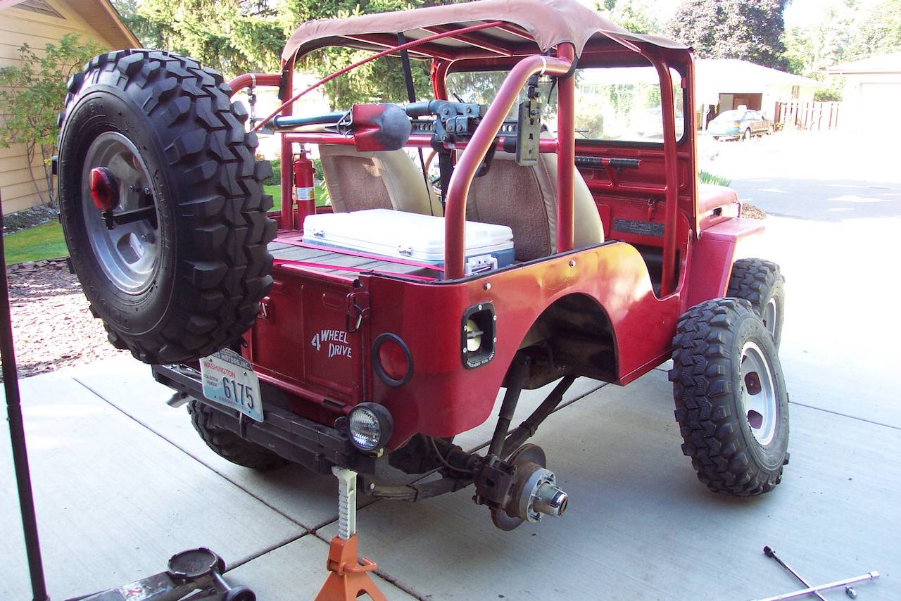 Jeep Wrangler JL Why the hate on Dynatrak ProFloat60? 1950 Cj3a rear qtr. view