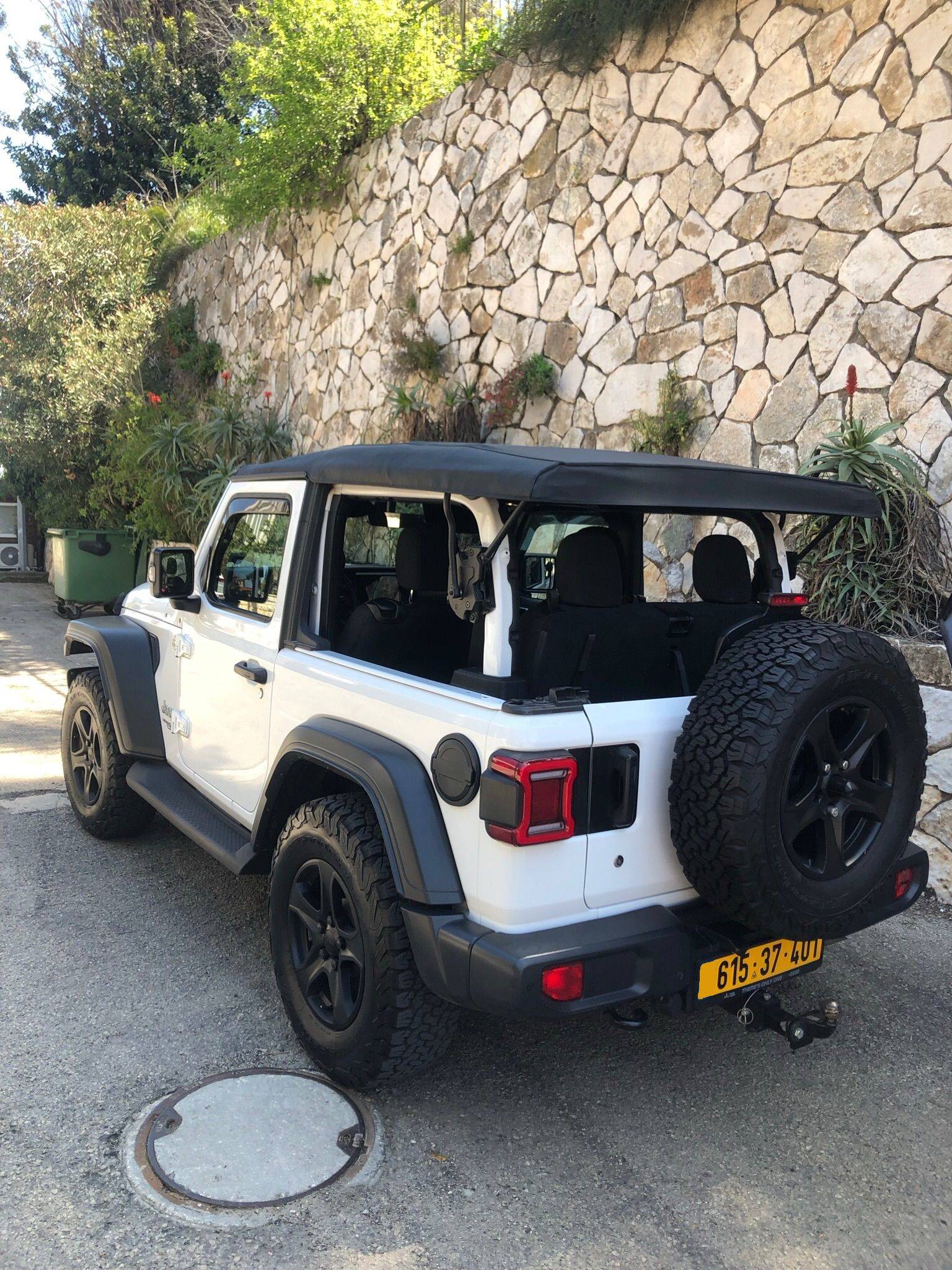 Can You Drive Jeep With Soft Top Half Open: Safety Tips Explained