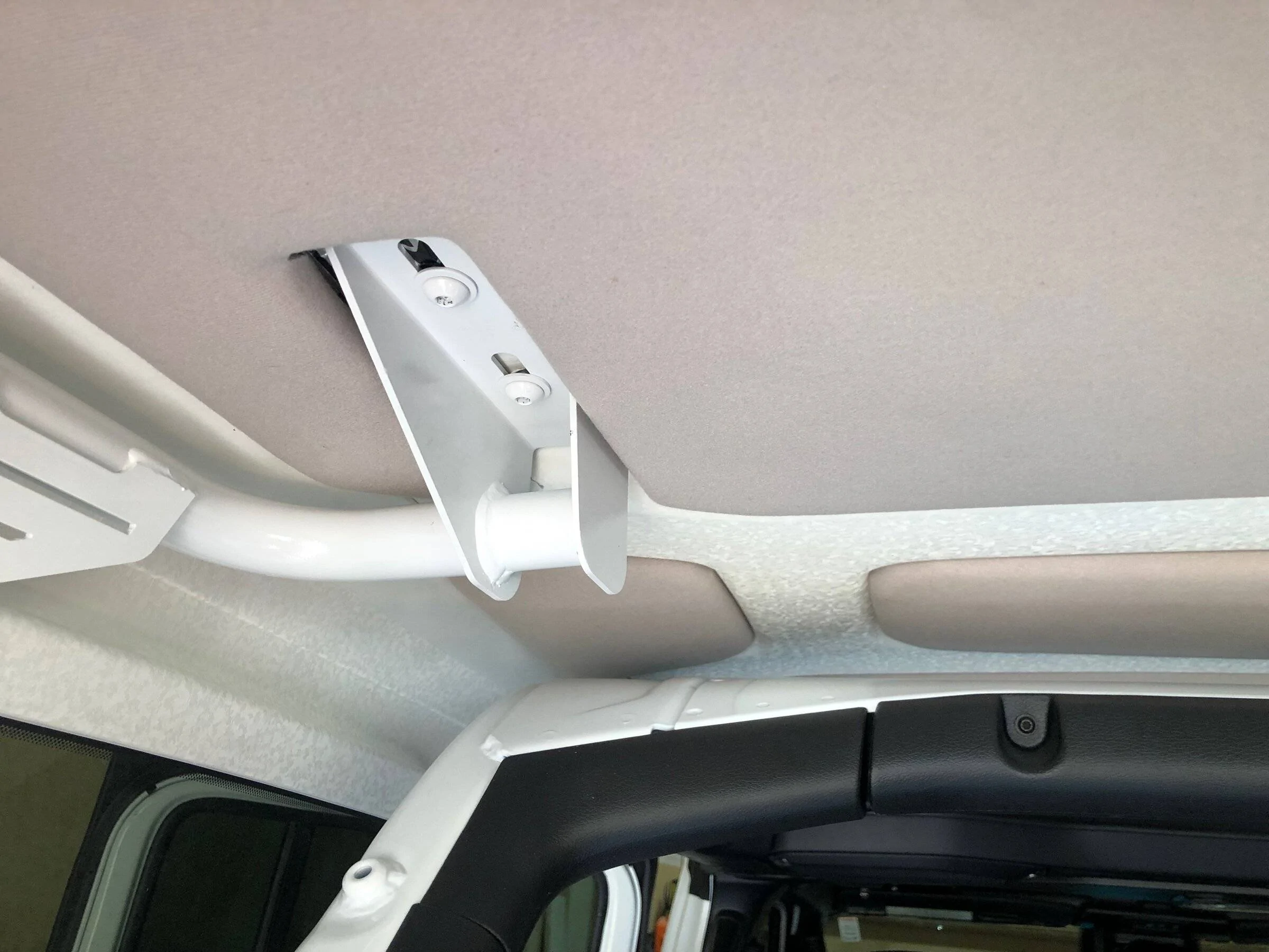 Jeep Wrangler JL ARB BASE Rack Installation on JLU Wrangler BaseRack_Headliner - 5
