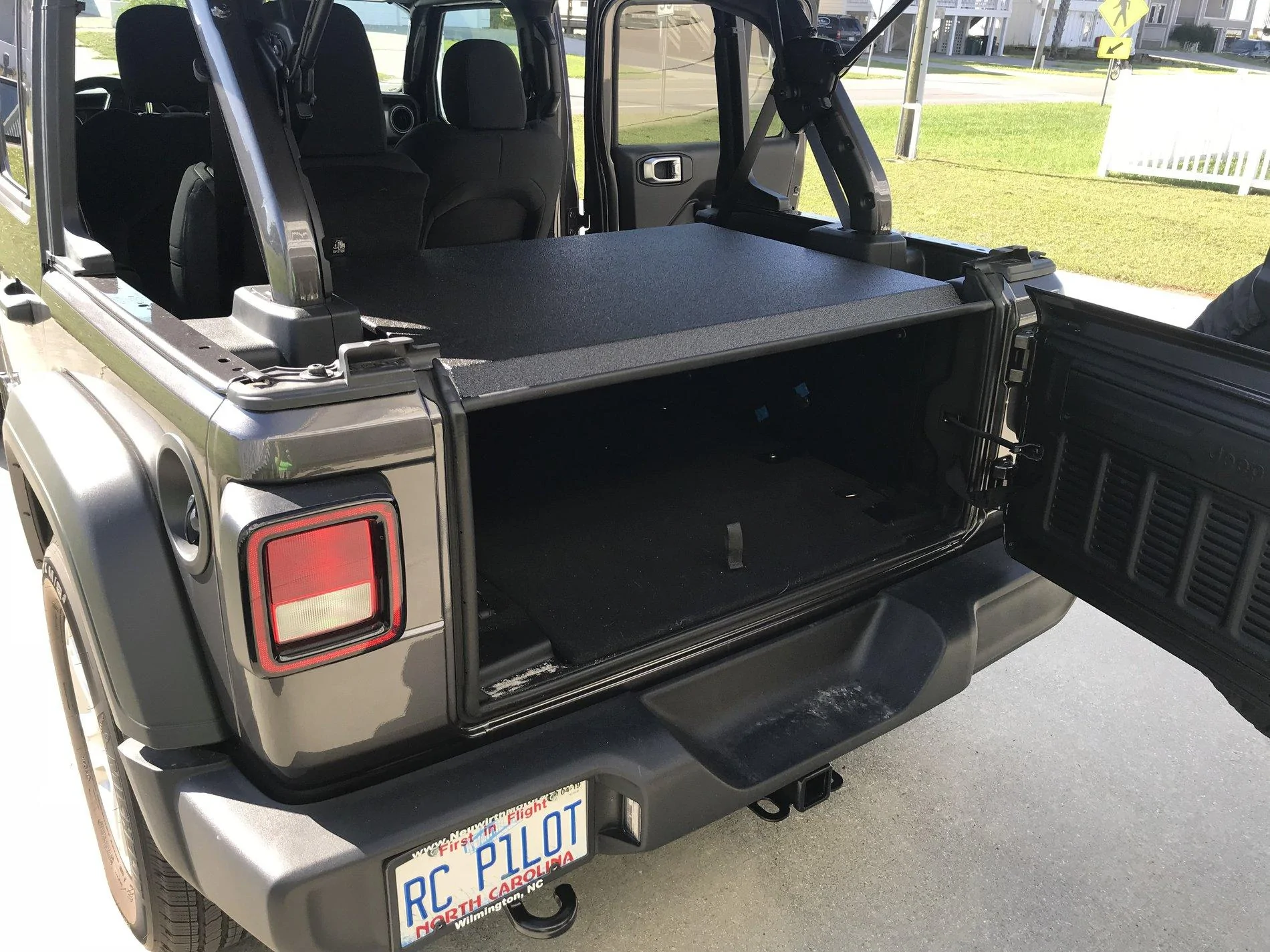 Jeep Wrangler JL Smittybilt Security Storage Vault installed in the JLUR! 158E67F3-90FF-46B6-A506-E3413D70991A