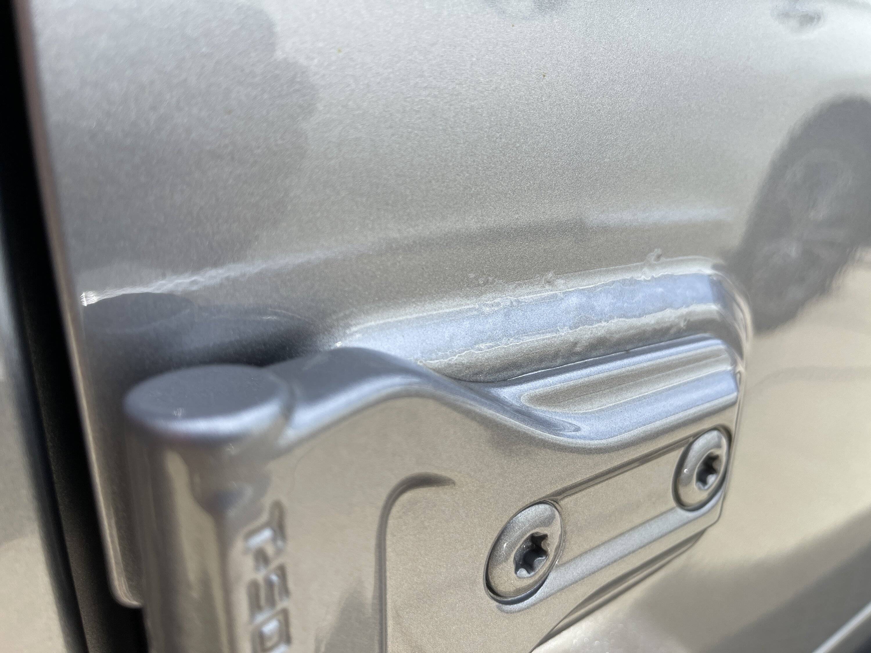 Jeep Wrangler JL Bubbles in Paint at Door Hinges 68830658-06F2-4E69-A59A-A2D596245ED8