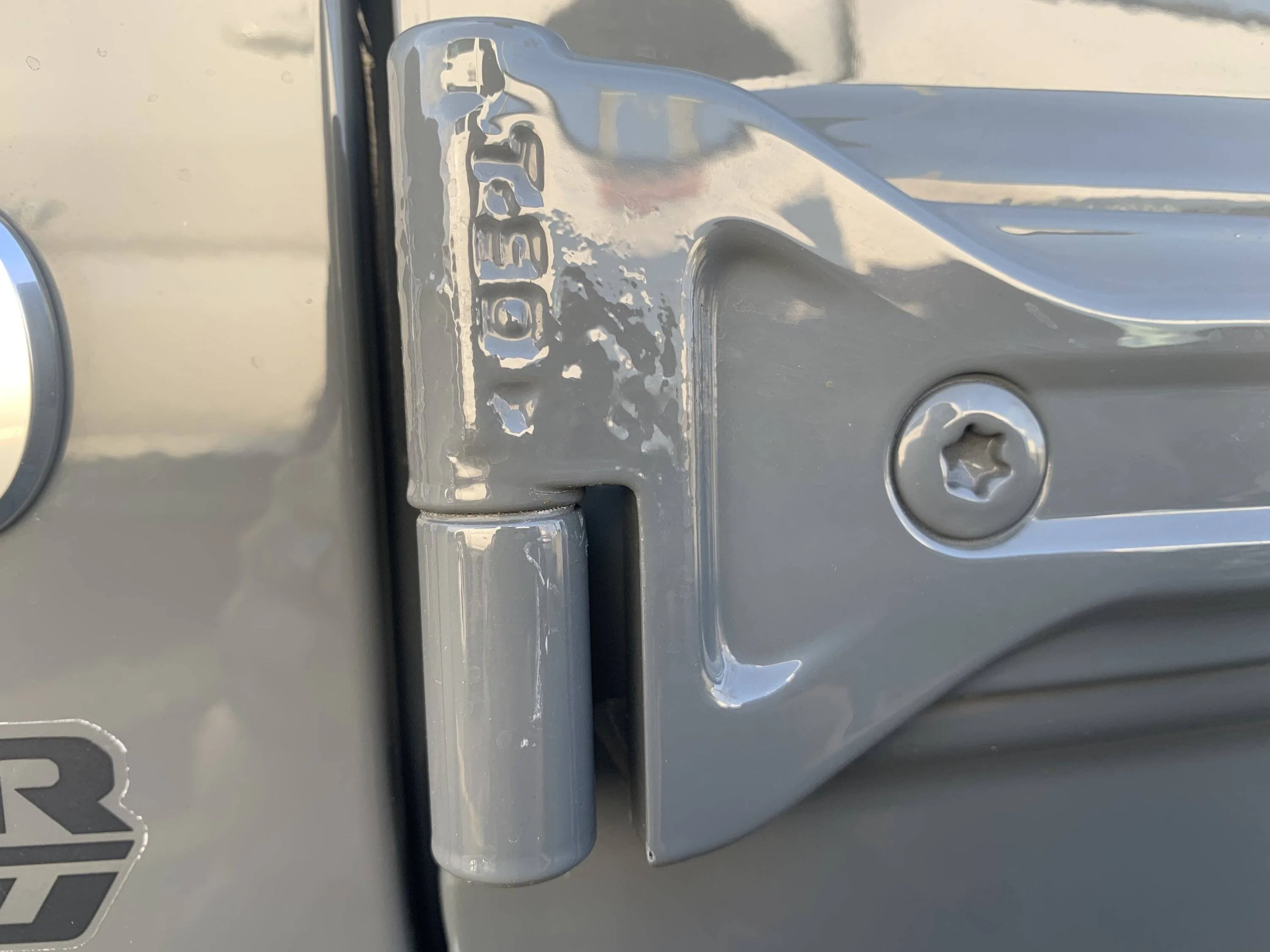 Jeep Wrangler JL Bubbles in Paint at Door Hinges 39435780-148D-4C48-B5F2-B249B6A6EE5F