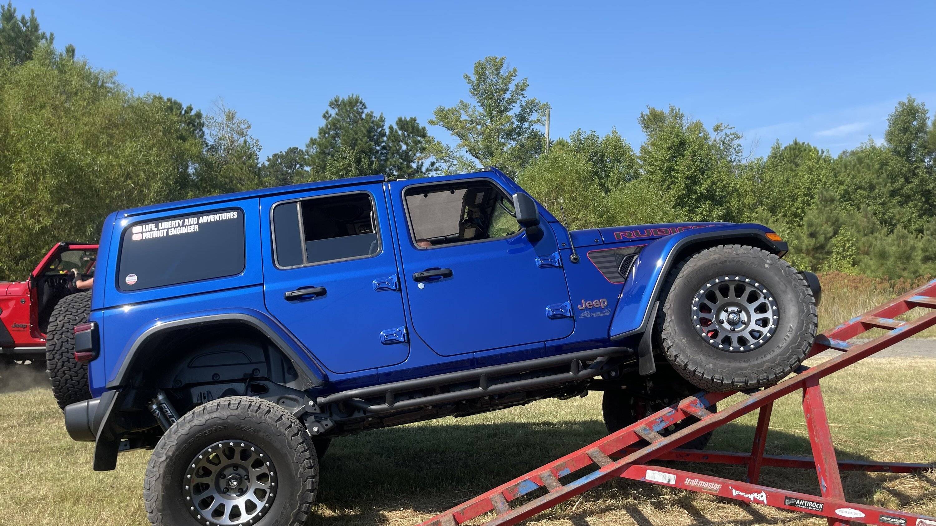 Jeep Wrangler JL First time on a ramp checking out the articulation.  Thoughts? 0D7D88E7-27BE-4B6D-9200-D62487F94E12