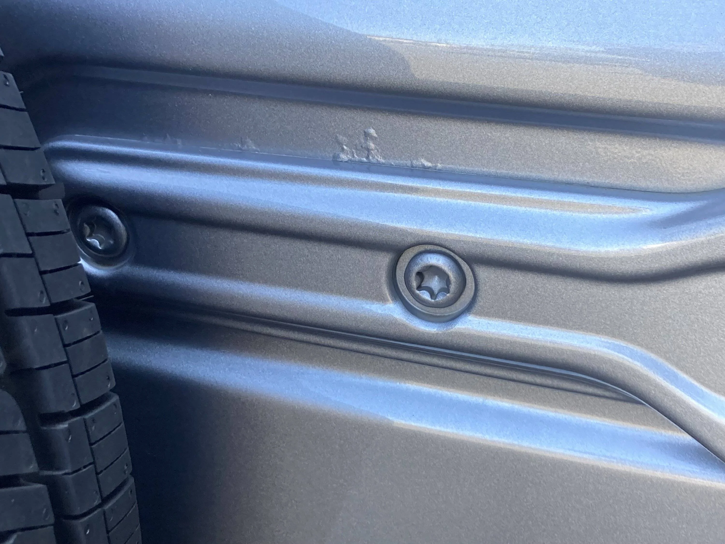 Jeep Wrangler JL Bubbles in Paint at Door Hinges TailgateTo