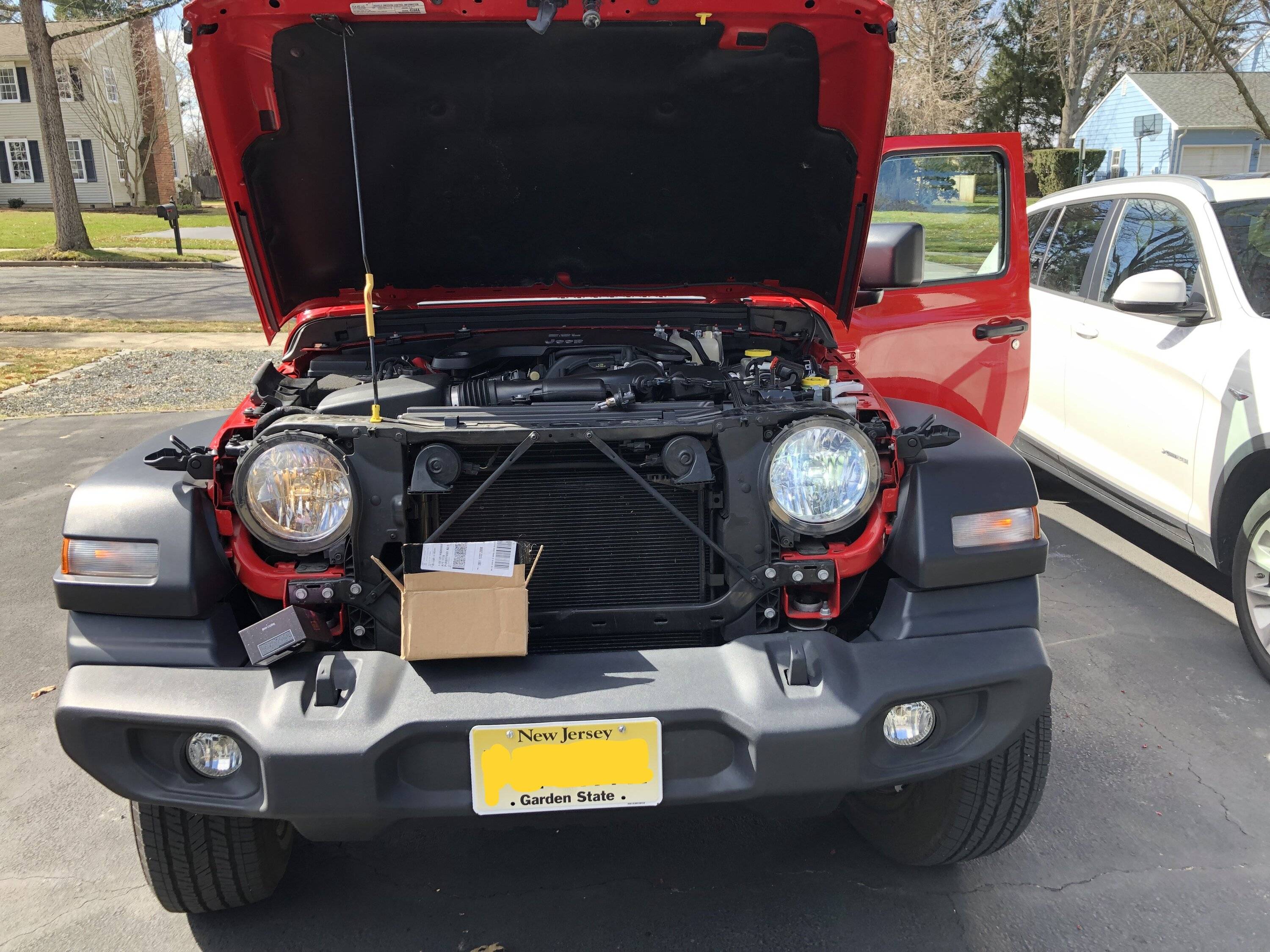 Jeep Wrangler JL Replacing factory halogen bulbs with LEDs headlight.JPG