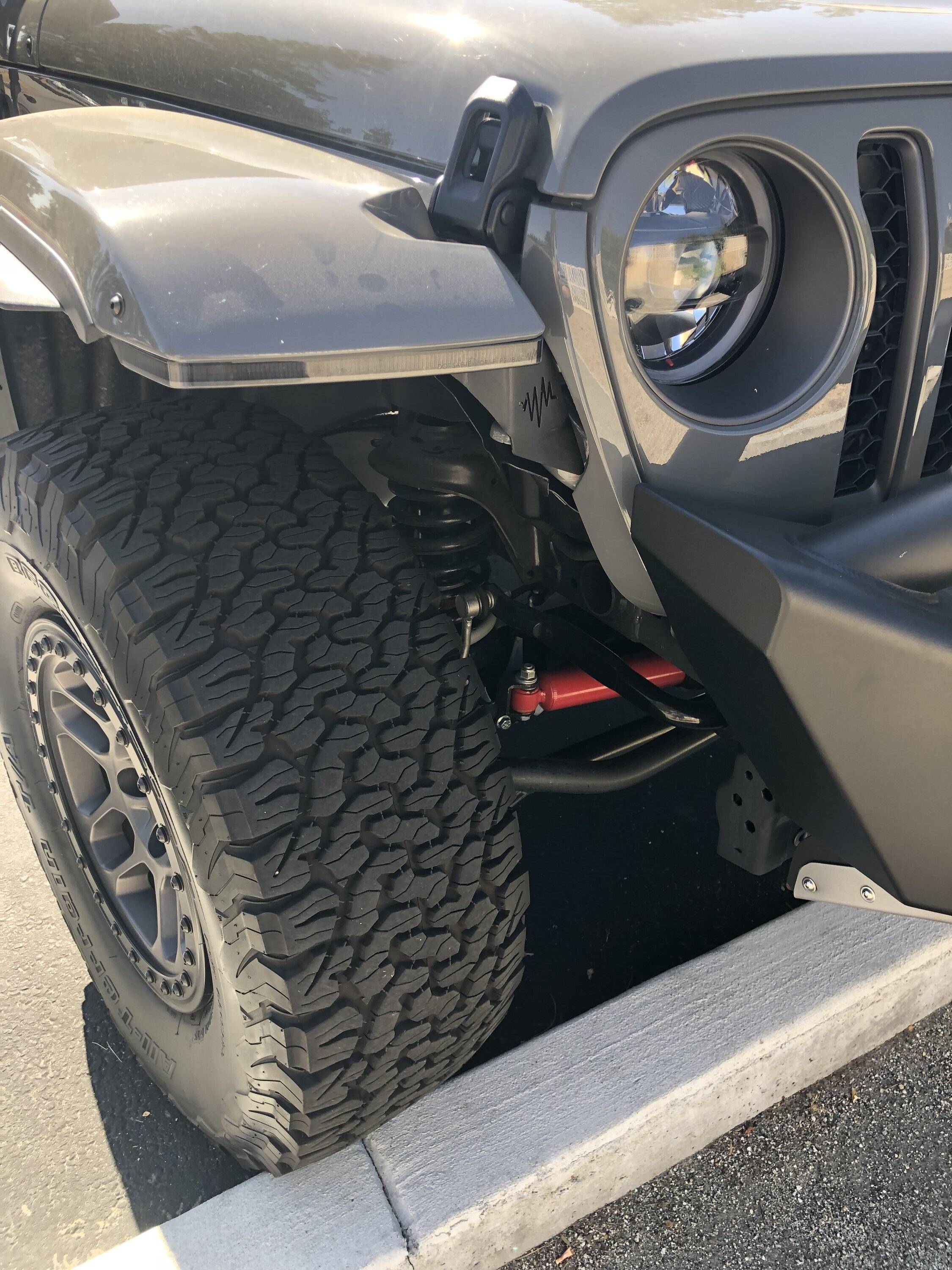 Jeep Wrangler JL Front mudflaps after fender chop? IMG_1361