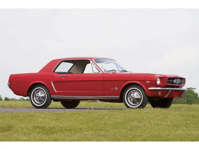 mump_0412_08_z+1964_ford_mustang_professional+red_side_view.webp