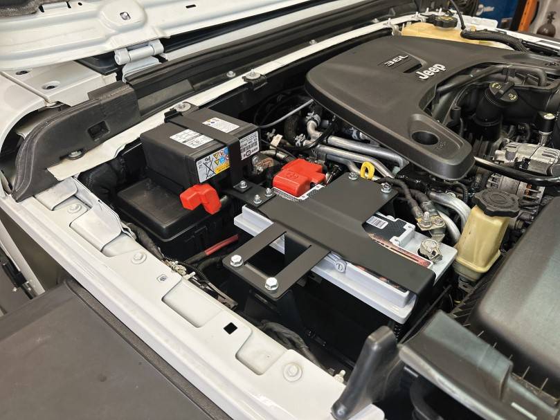 Jeep Wrangler JL Love ESS but hate the battery location? 2 new options from Genesis Offroad! JL_Stock_Relocation_Kit_DETAIL_1-020224 (Custom)