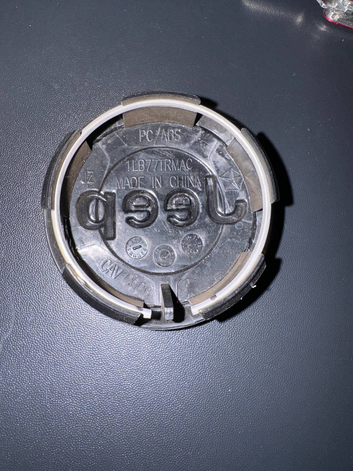 Jeep Wrangler JL Part number for wheel cap? IMG_1662