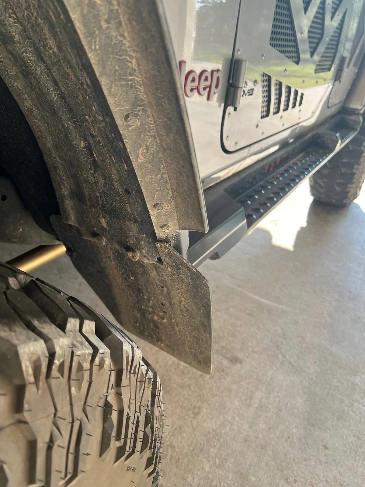 Jeep Wrangler JL Mud flaps vs. side steps for rocks protection? IMG_3984
