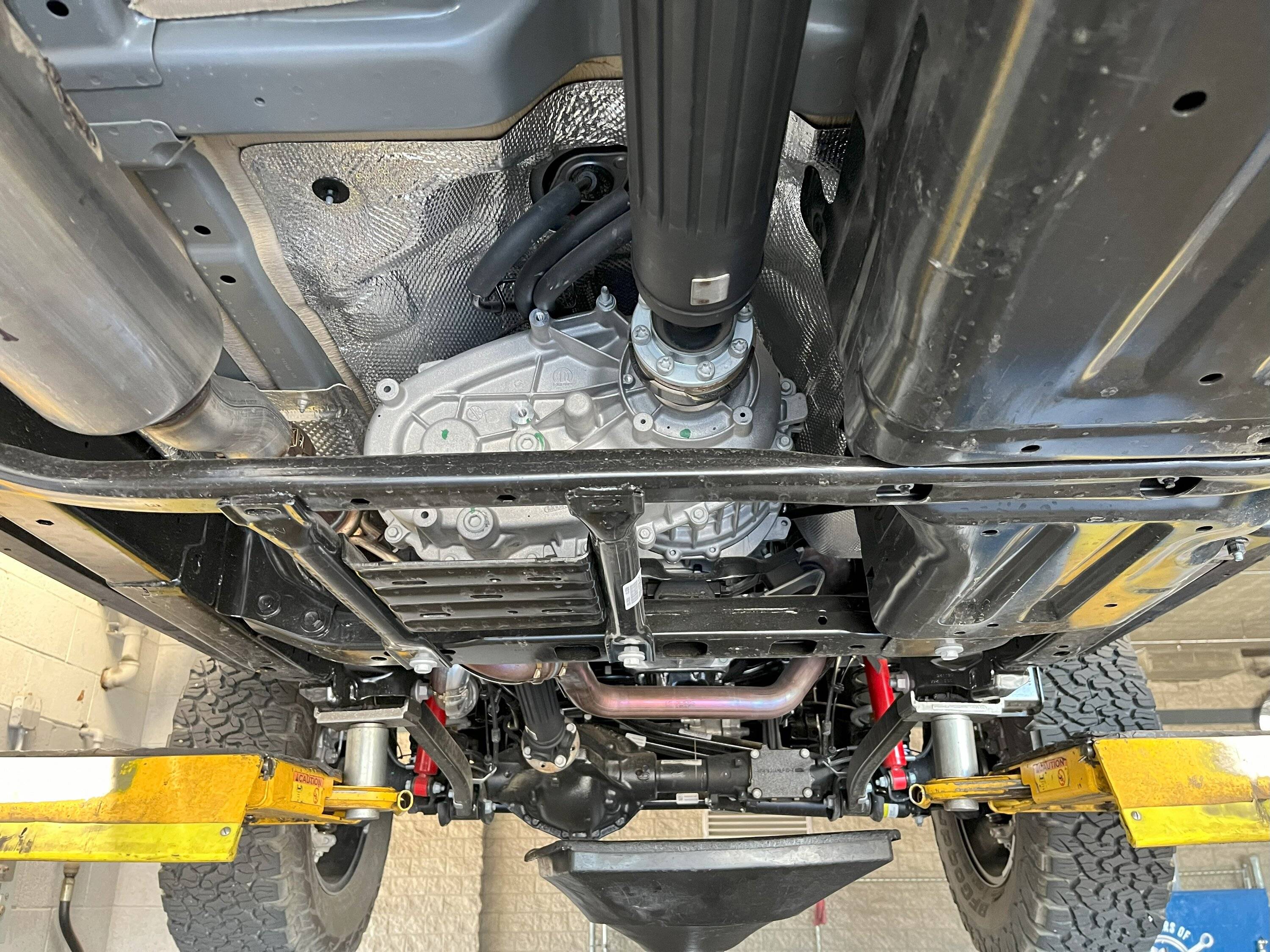 Jeep Wrangler JL Undercarriage pictures from my 2024 Wrangler Rubicon while on lift (for first oil change) IMG_0830