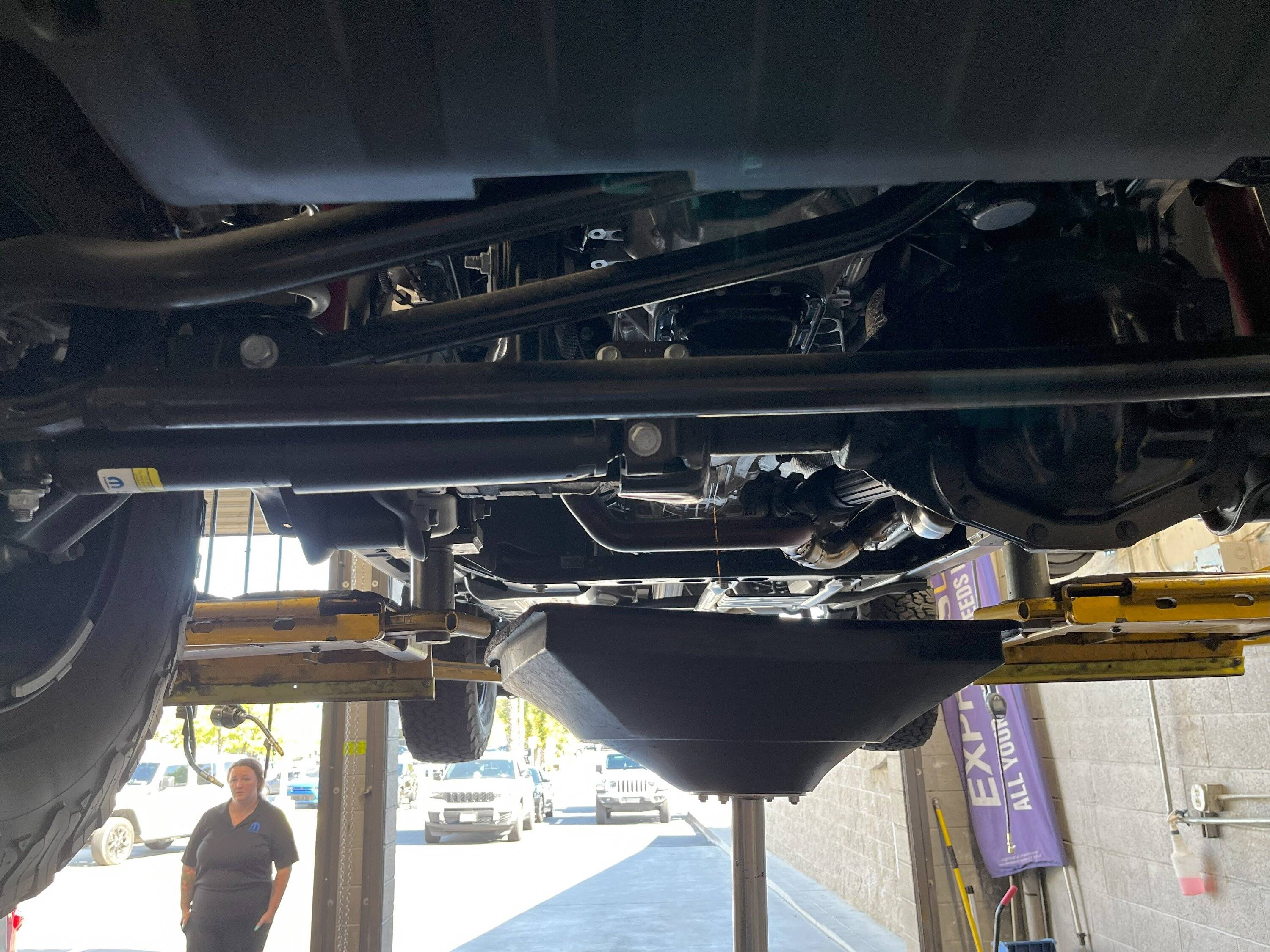 Jeep Wrangler JL Undercarriage pictures from my 2024 Wrangler Rubicon while on lift (for first oil change) IMG_0837