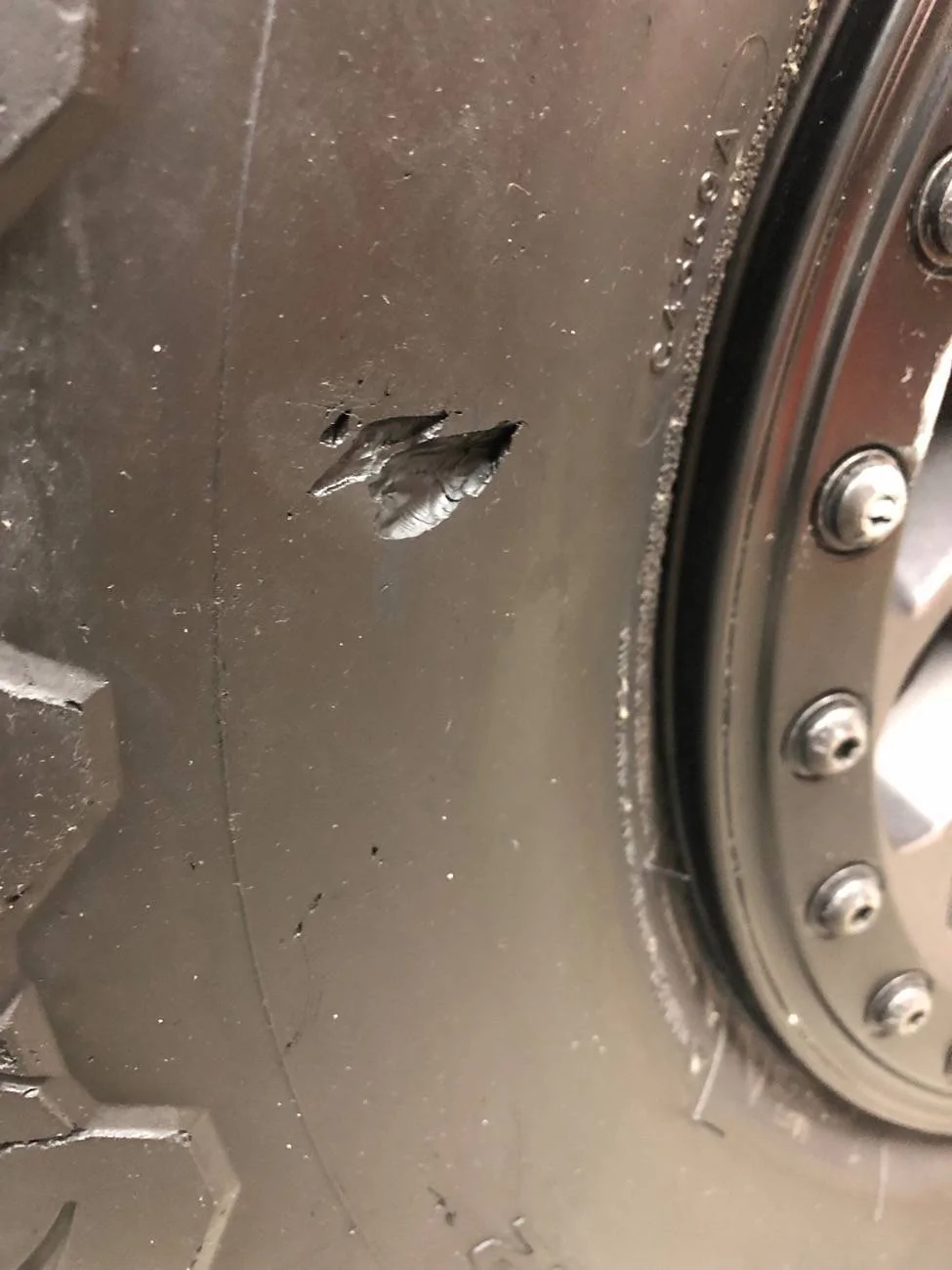 Jeep Wrangler JL Sidewall cut with rock IMG_1758