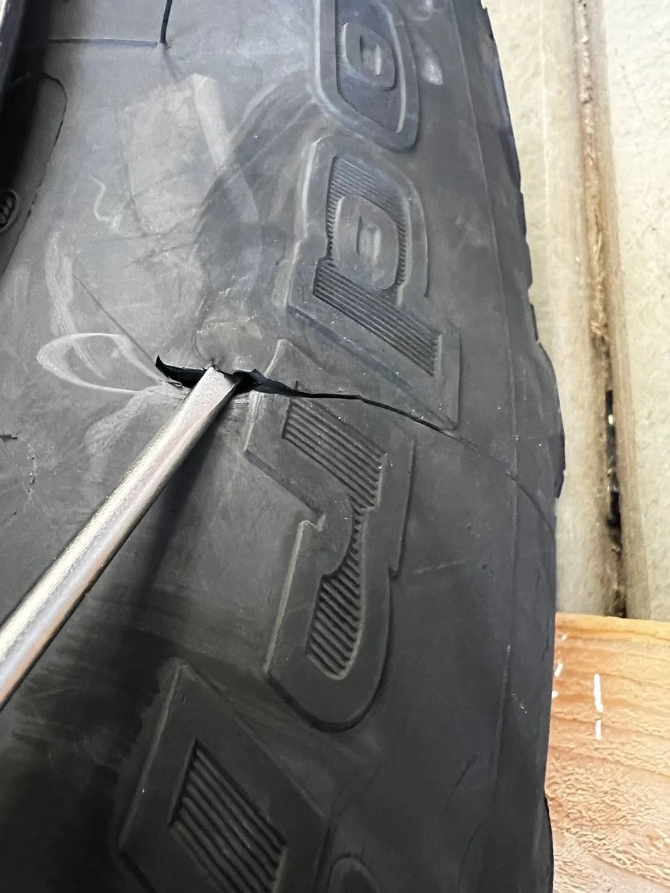 Jeep Wrangler JL Sidewall cut with rock IMG_1757