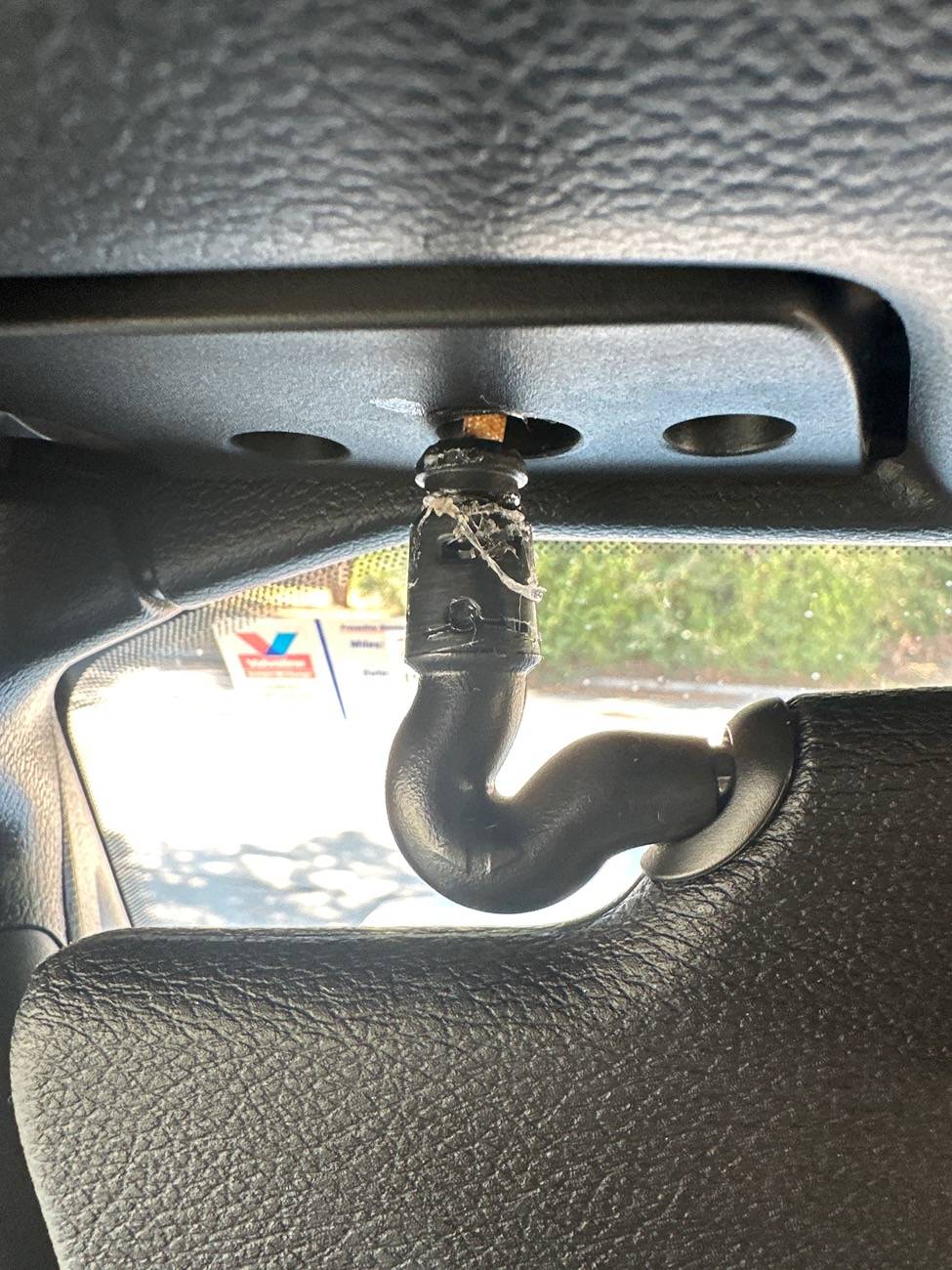 Jeep Wrangler JL Sunvisor fell down!! How can I reattach it? image